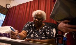 Joyce King receives a new ballot at her nursing home on Sunday, Nov. 3, 2024 in South Philadelphia.