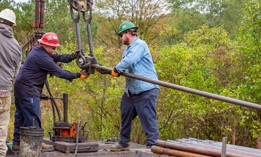 Workers for the nonprofit Well Done Foundation plug an abandoned oil well that was leaking methane.