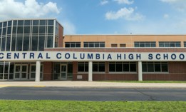 An exterior view of Central Columbia High School in Bloomsburg and its 3.8 megawatt array with nearly 7,000 bifacial solar panels, which is estimated to offset 90% of the school district's annual power consumption. 