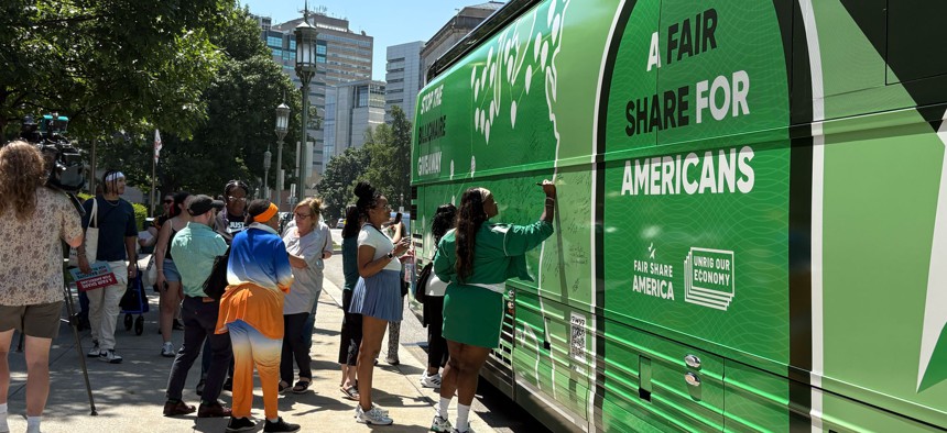Fair Share America’s ‘Stop The Billionaire Giveaway’ bus at the Pennsylvania Capitol.