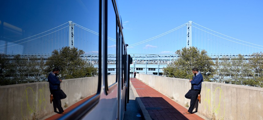 A SEPTA bus is parked as the driver takes a break before continuing its route.