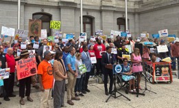 Lawmakers and transit advocates speak at a press conference outside Philadelphia City Hall on Wednesday, August 6, 2025.
