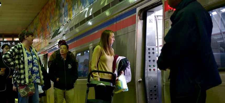 SEPTA riders, shown here at a Center City station, face service cuts and higher fares
