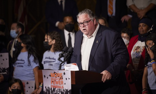 State Rep. Tim Briggs, the chair of the House Judiciary Committee, speaks at a rally to end gun violence in May 2022.
