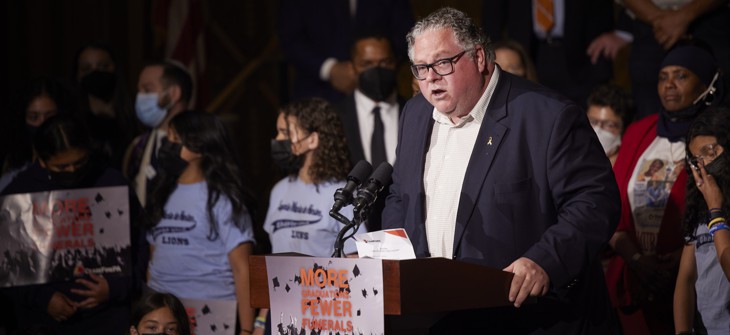 State Rep. Tim Briggs, the chair of the House Judiciary Committee, speaks at a rally to end gun violence in May 2022.