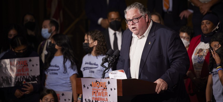 State Rep. Tim Briggs, the chair of the House Judiciary Committee, speaks at a rally to end gun violence in May 2022.