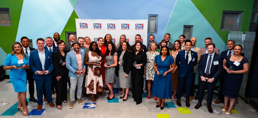 The 2025 Forty in Their 40s honorees assemble for a group photo.