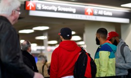Travelers wait in long lines after Philadelphia Airport TSA and airport workers held a protest rally outside the Philadelphia International Airport on January 25, 2019.