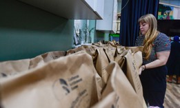 Volunteers at the Lutheran Settlement House pack bags of groceries to distribute to the local community for their daily food pantry in Philadelphia, Pennsylvania, on Oct. 30. Starting on Nov. 1, Supplemental Nutrition Assistance Program benefits are set to lapse, impacting millions of Americans amid the government shutdown.