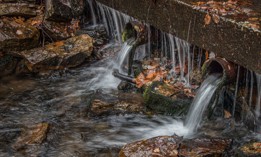 Stormwater flows from pipes into a stream in Berks County, Pennsylvania.