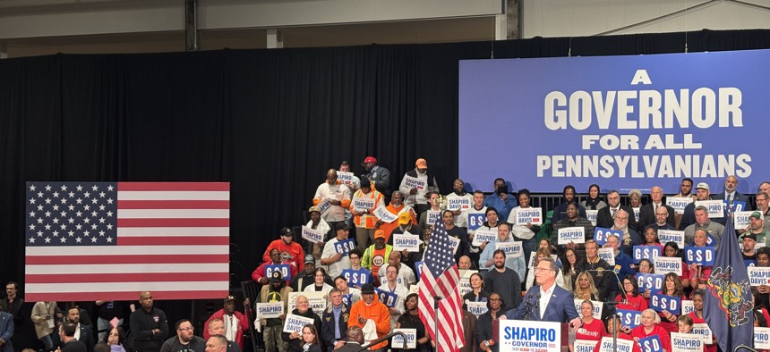 Gov. Josh Shapiro, at lectern, launched his reelection bid in Philadelphia on Thursday night.