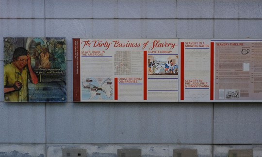 Signage about slavery is displayed at Independence National Historical Park.