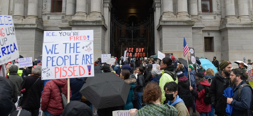 Protesters gather outside of Philadelphia City Hall during a protest against ICE and the killing of Renee Good on Saturday, January 10, 2025.