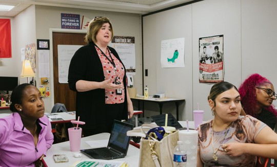 Shannon Salter, an Allentown social studies teacher, gives feedback following a senior presentation.
