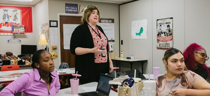 Shannon Salter, an Allentown social studies teacher, gives feedback following a senior presentation.
