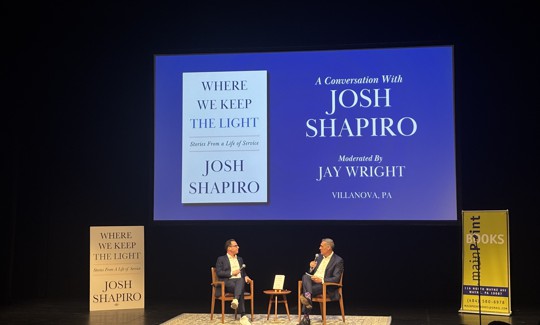 Gov. Josh Shapiro, left, talks with former Villanova basketball coach Jay Wright on Saturday, Feb. 28, 2026.