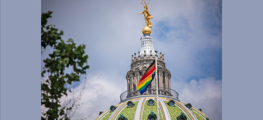 A Pride flag flies at the Pennsylvania Capitol. 