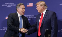 U.S. Sen. Dave McCormick speaks with President Donald Trump at the 2026 Pennsylvania Defense and Innovation Summit.