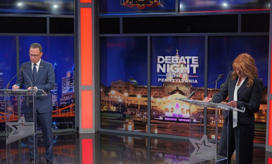 Gov. Josh Shapiro and state Treasurer Stacy Garrity met on the debate stage Wednesday night in Harrisburg.