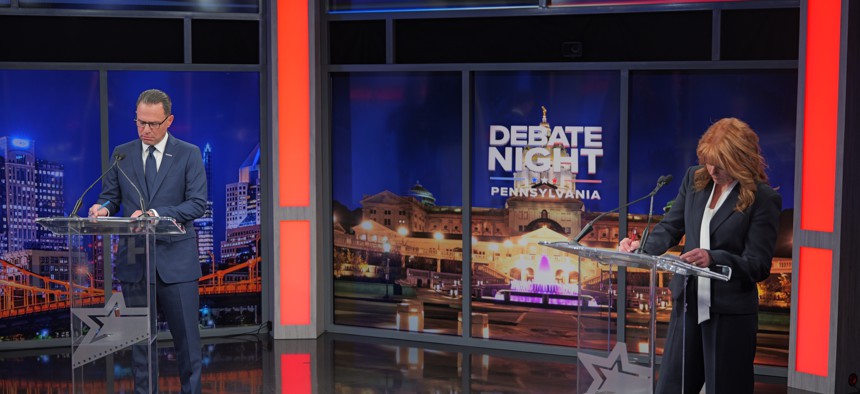 Gov. Josh Shapiro and state Treasurer Stacy Garrity met on the debate stage Wednesday night in Harrisburg.